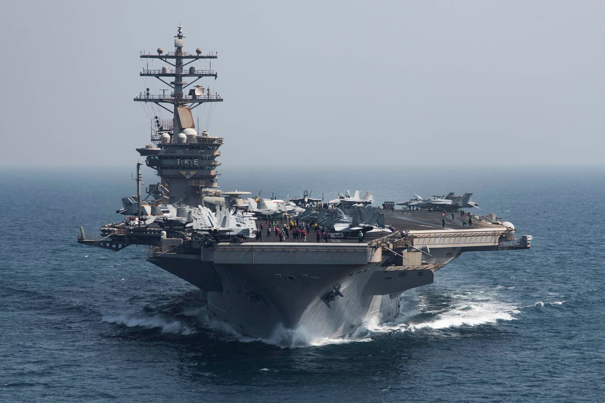 Photos show nuclear-powered aircraft carrier USS Dwight D. Eisenhower ...